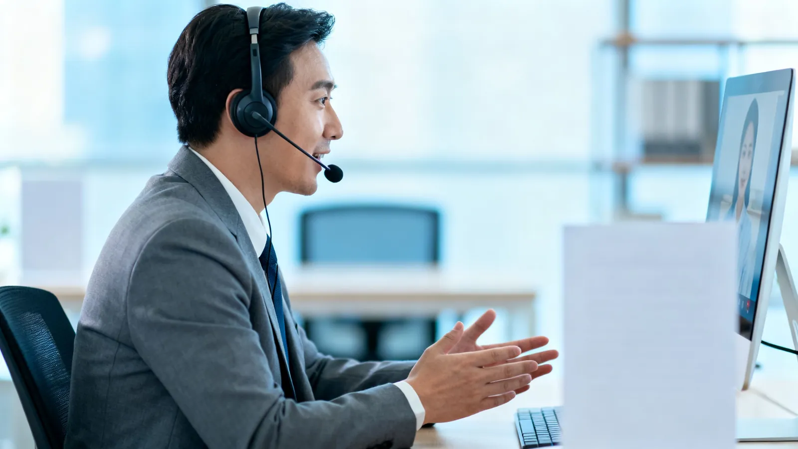 A consultant helping a client on a video call